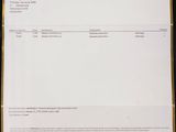 a close up of a piece of paper with a letter on it
