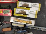 many different types of toy trains on the table