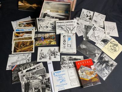a lot of old comic books on a black table