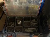 a tool box filled with many different tools on the floor