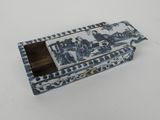 blue and white porcelain cigarette case with a design of a man and a woman