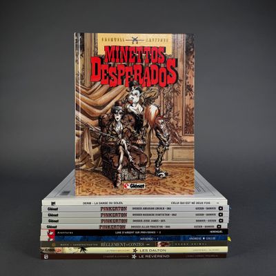 books stacked on top of each other on a gray surface