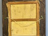 an old picture frame with a rope hanging from it ' s sides