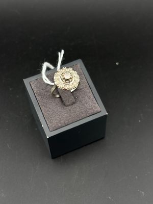 sterling silver ring in a black gift box with a rope
