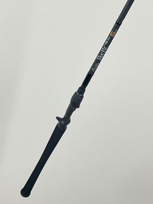 a close up of a fishing rod on a white background