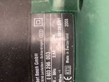 a close up of a green machine with a label on it