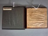 two books that are sitting on a table together