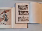 a book open on a table with pictures on it