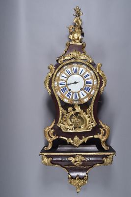 a clock that is hanging on the wall in the room