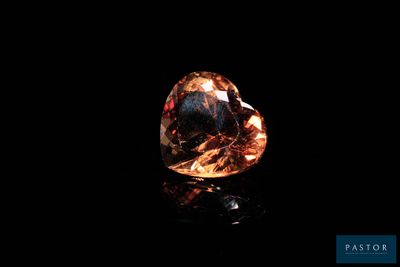 a brown diamond on a black background