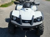 an image of a four wheeler atv parked on the side of the road