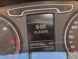 a close up of a car dashboard with a clock on it