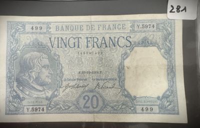 un ancien billet français de 20 francs sur lequel figure le portrait d'un homme