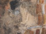 tableau représentant un homme assis sur une chaise, coiffé d'un chapeau