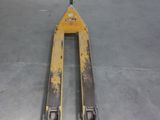 a fork lifter that is sitting in the garage
