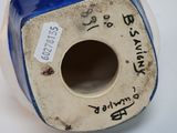 a blue and white vase with writing on it