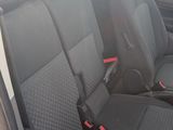a white van with black seats in the back of it