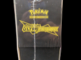 a clear box with a black and yellow logo on it
