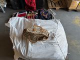 a pile of luggage sitting on the floor next to a pile of luggage