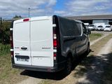 a van that is parked on the side of the road