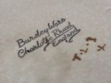 an image of a close up of a plate with writing on it