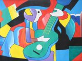 un tableau représentant un homme jouant de la guitare accroché au mur