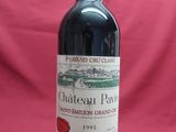 a bottle of wine that is sitting on a table