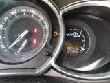 a close up of a car dashboard with a speedometer