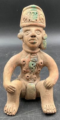 an image of a statue of a man with a hat on his head