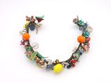 multicolored beaded bracelet with glass beads on a white background