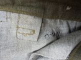 an image of a close up of a pair of jeans with a label on it