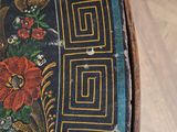 a close up of a table with a design on it