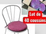 une photo d'une chaise recouverte de nombreux coussins