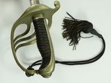 a close up of a sword with a tassel attached to it