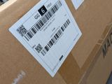 a cardboard box with a barcode on it sitting on a table