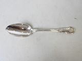 a spoon that is sitting on a table