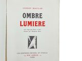 an open book with the title ombre lumiere on it