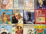 a lot of comic books that are on the table