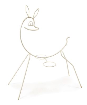 a white metal sculpture of a bird with a hat on it ' s head