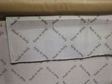 a picture of a piece of paper taped to the back of a chair