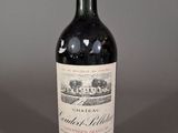 a bottle of wine that is sitting on a table