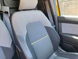two seats in the back of a van with yellow trims