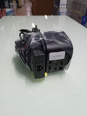 an image of a black power strip on a white table