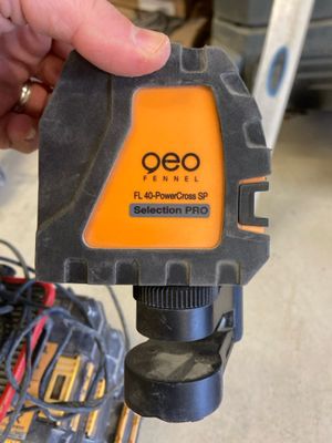 an image of a person holding a tool in their hand