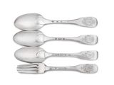 four silver spoons and a fork are lined up on a white surface