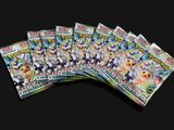 a group of pokemon cards sitting on top of each other