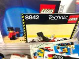 a pile of lego technics sitting on a table