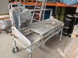 an image of a metal bench in a garage