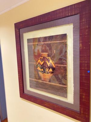 a picture of a painting hanging on the wall in a hallway