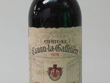 a bottle of wine that is sitting on a table